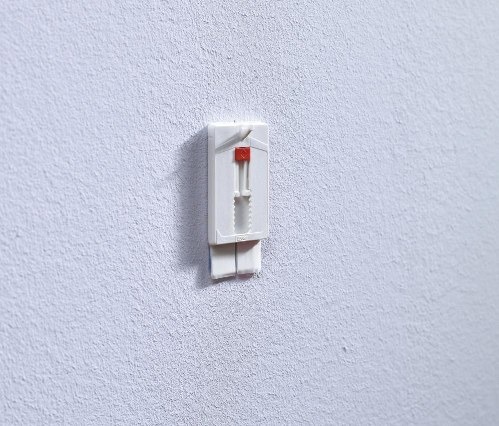 Tesa - Nastavitelný nalepovací klinec na všetky typy stien (max 2x2kg)